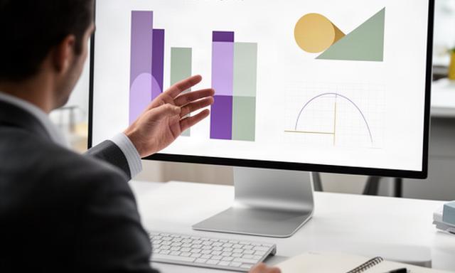 Data editor annotating a clean financial visualization on a large monitor